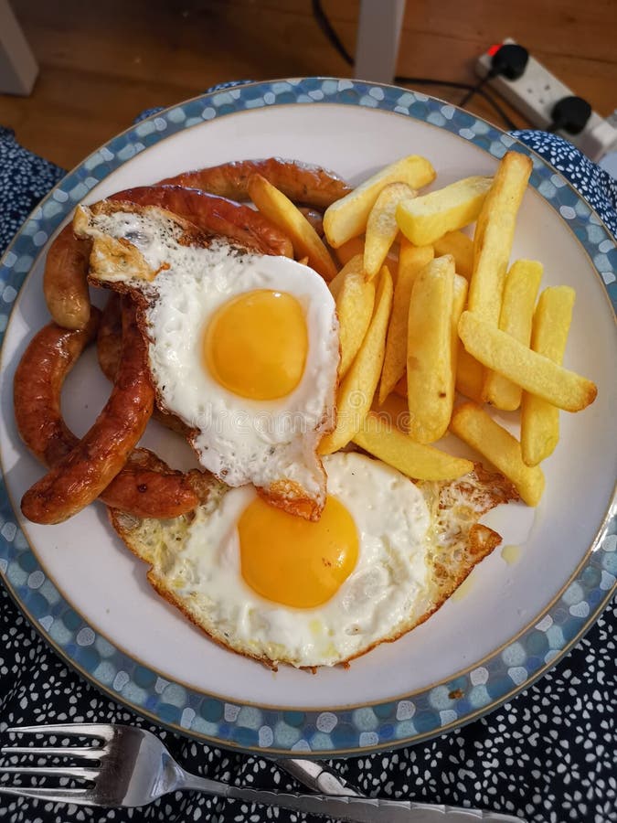Sausages eggs and chips stock image. Image of brunch 232487757