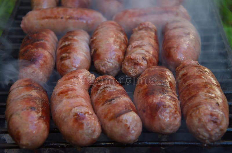 Sausages on the grill stock photo. Image of preparation 27485280
