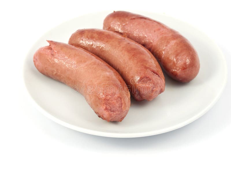 Sausages on a plate stock photo.