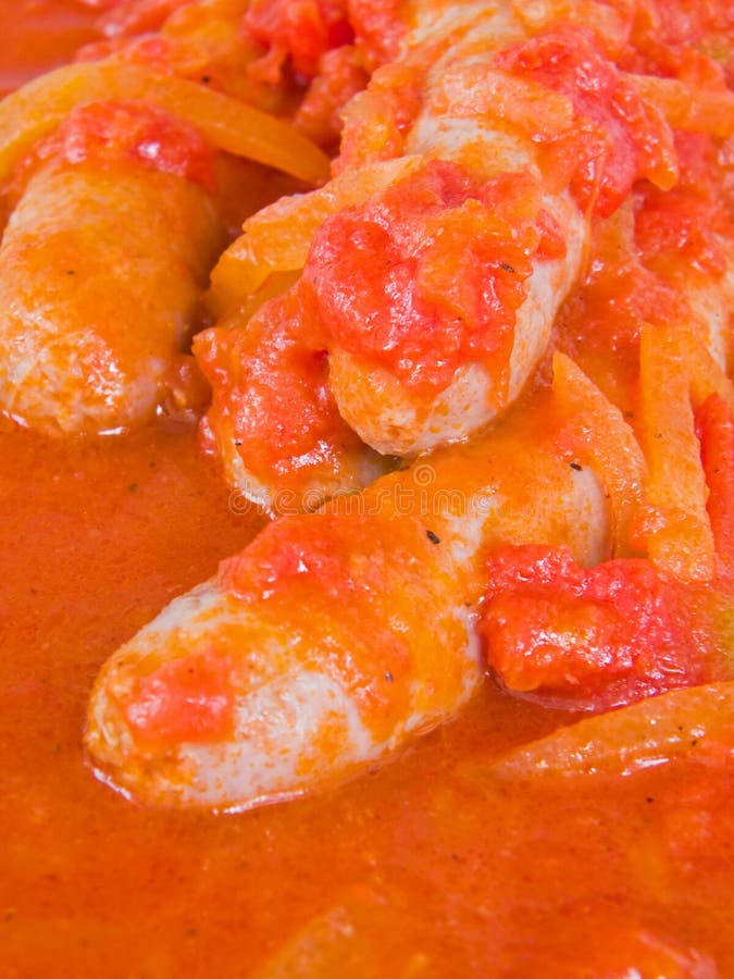 Sausages in tomato sauce. stock image. Image of palatable 13971721