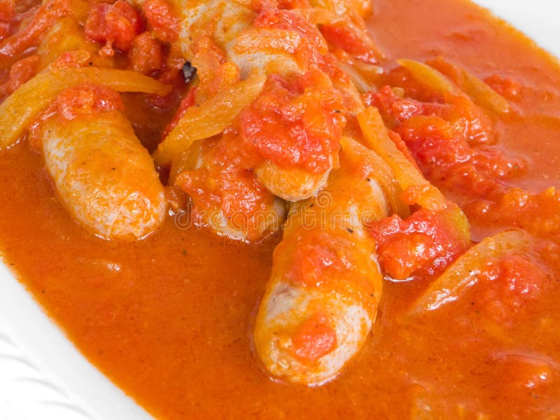 Sausages in tomato sauce. stock image. Image of palatable 13971721