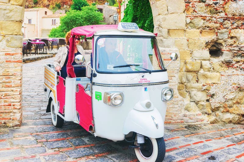 Three wheeled auto rickshaw in Savoca street stock photo Three wheeled auto rickshaw in Savoca street stock photo