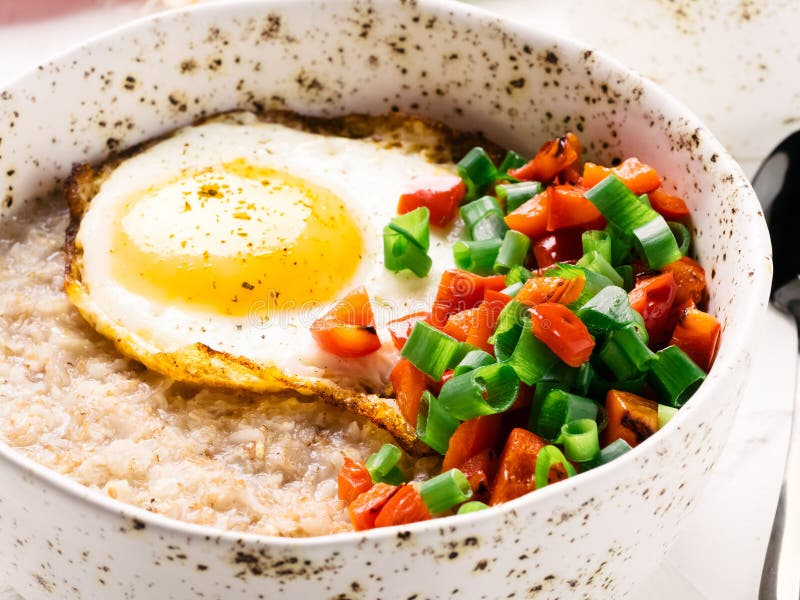 Savory Oatmeal, Served with Vegetables and Fried Egg Stock Image ...