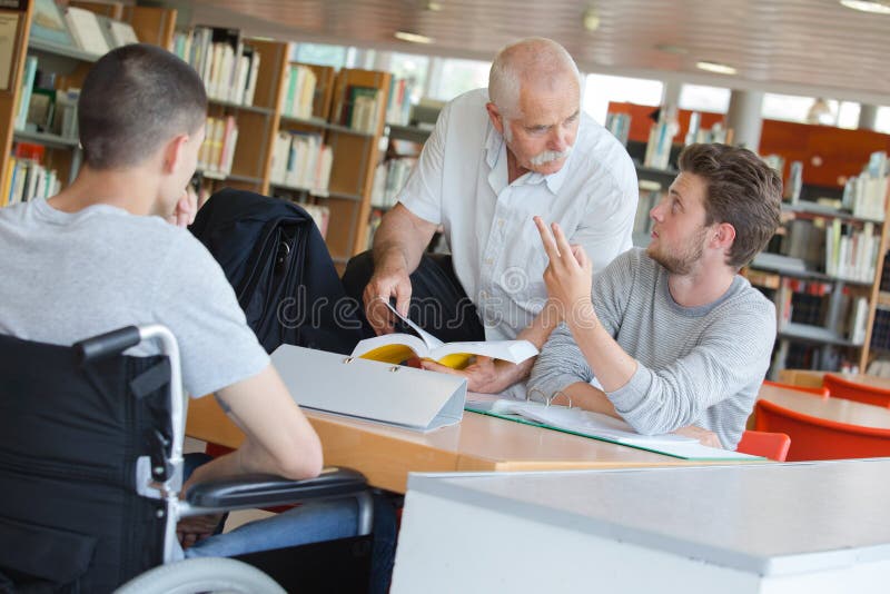 Saw professor in library stock image