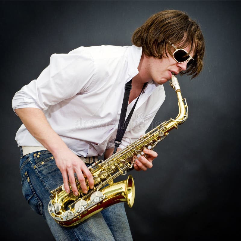 Joueur de saxophone image stock. Image du jazz, roche 13256391