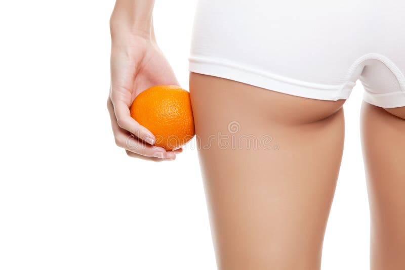 Slim Young Woman Small Boobs Puts Big Orange Fruit In Her Bra. Breast  Enlargement Size Correction Concept. Stock Photo, Picture and Royalty Free  Image. Image 143825659.