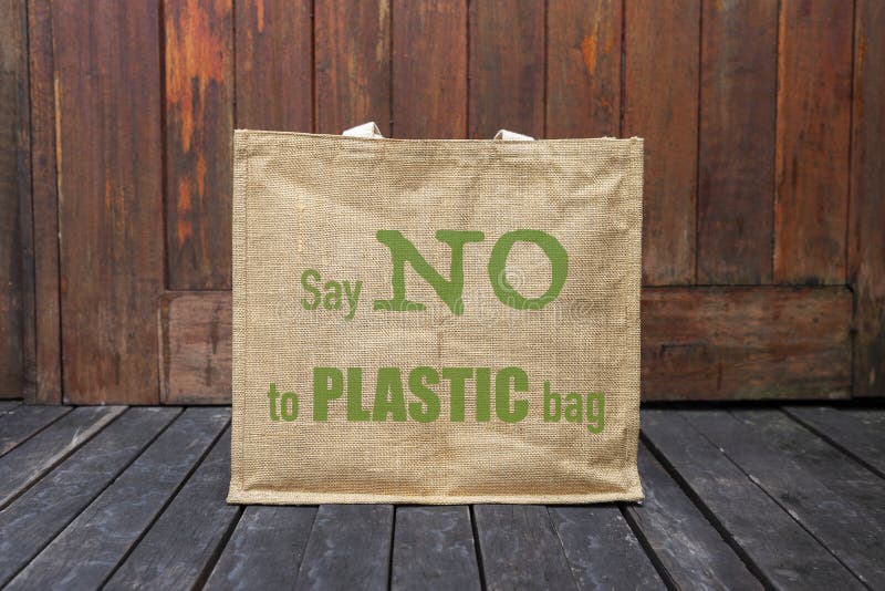 Jute Bag with No Plastic Logo Hanging on Old Wooden Wall Stock Photo ...