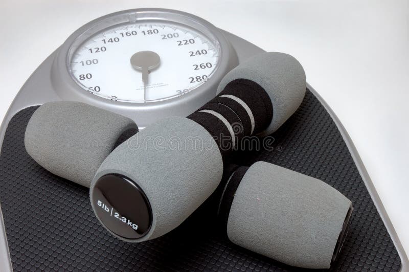 Scale and Hand Weights stock photo. Image of step, pounds 4949878