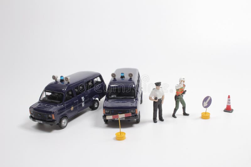 Scale Police Car Model with Figure at the White Board Stock Photo