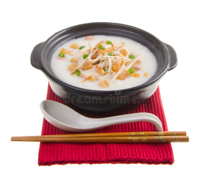 Scallop porridge rice gruel served in claypo