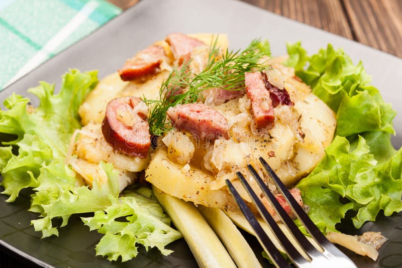 Scalloped Potatoes with Sausage and Bacon Stock Image Image of oval