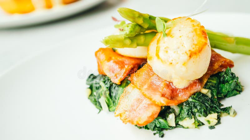Scallops shell with bacon and asparagus stock photo Scallops shell with bacon and asparagus stock photo