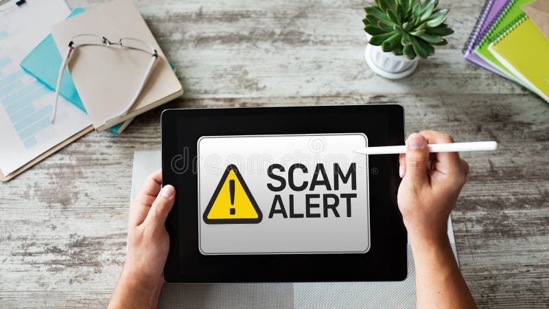 Scam alert detecting warning. Notification on device screen. stock images