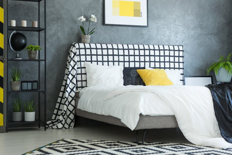 Scandinavian bedroom with white orchid