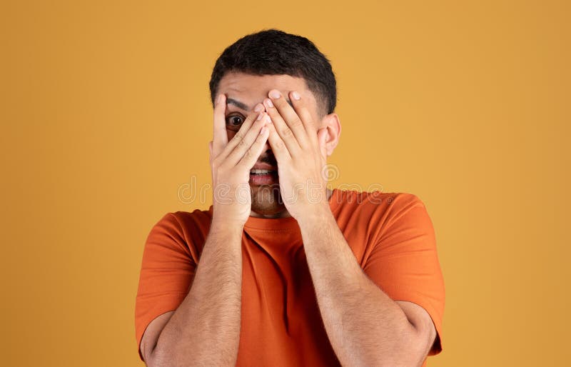 Man scared hands face hi-res stock photography and images - Alamy