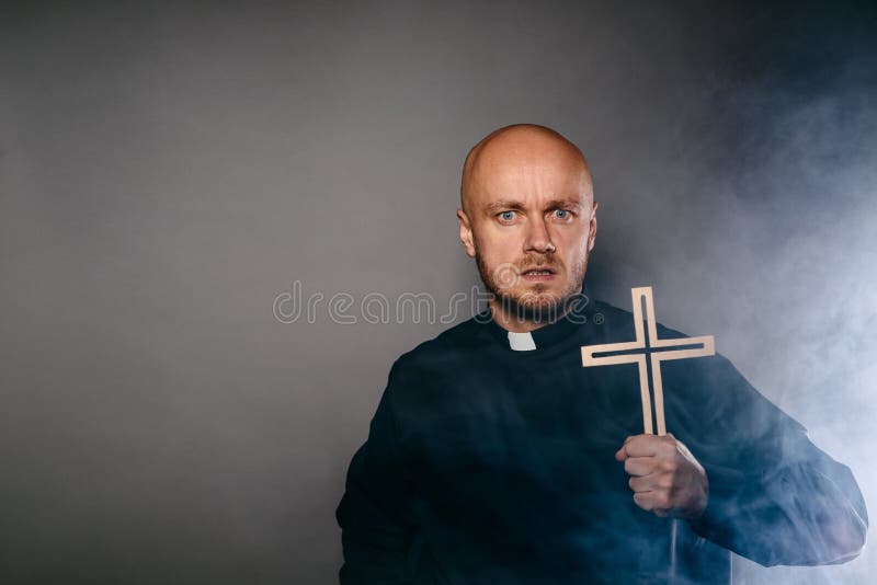 Scared frightened exorcist catholic priest royalty free stock images Scared frightened exorcist catholic priest royalty free stock images
