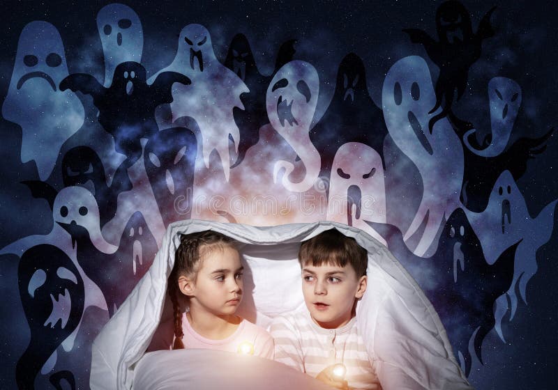 Scared girl and boy with flashlighst royalty free stock images Scared girl and boy with flashlighst royalty free stock images