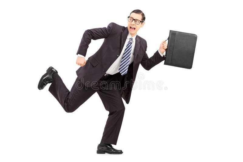 Scared male businessman running away from something royalty free stock images