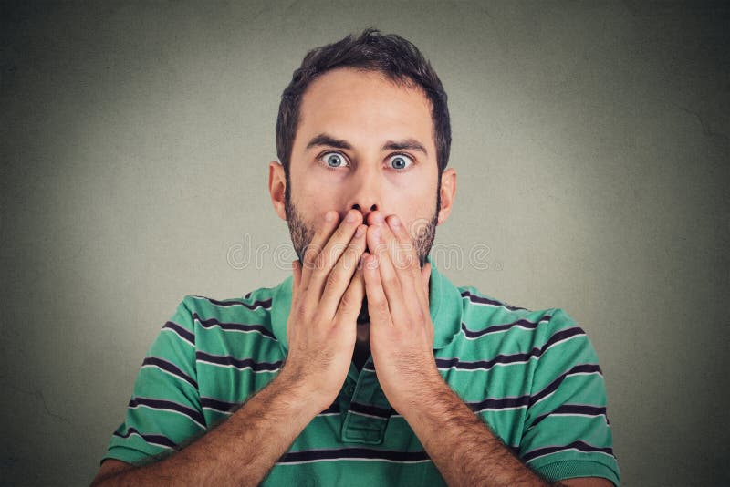 Scared shocked young man royalty free stock image
