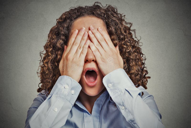 Scared woman covering eyes wide open mouth royalty free stock photos Scared woman covering eyes wide open mouth royalty free stock photos