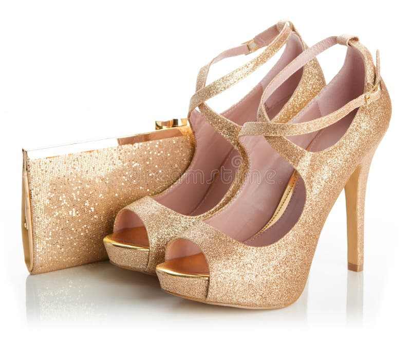 Scarpe e borsa dorate da donna immagine stock libera da diritti