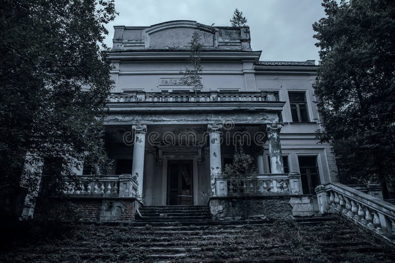 Scary abandoned manor in a dark forest.