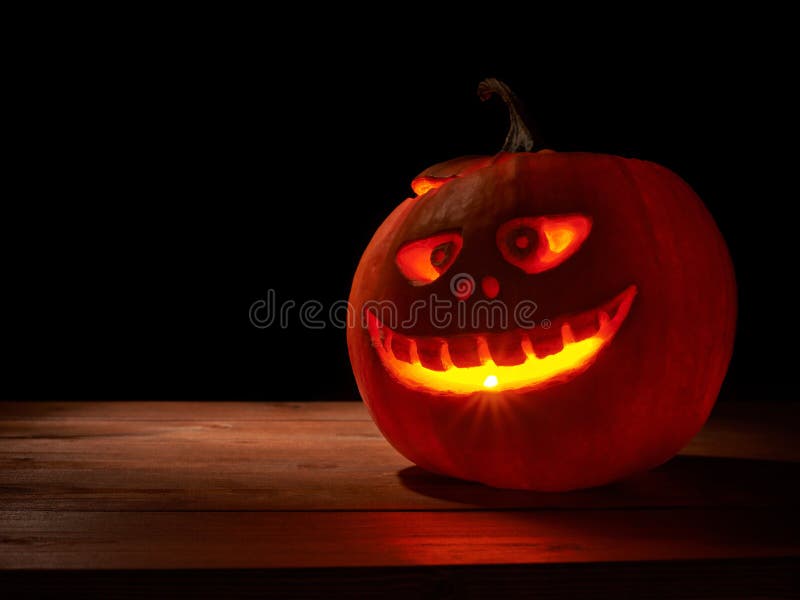 Scary jack o lantern pumpkin composition