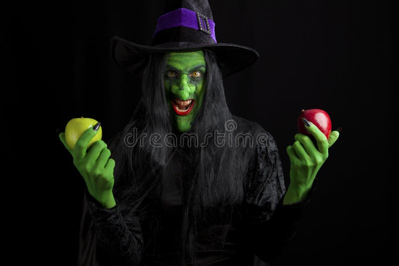 Scary witch and her poisonous apples