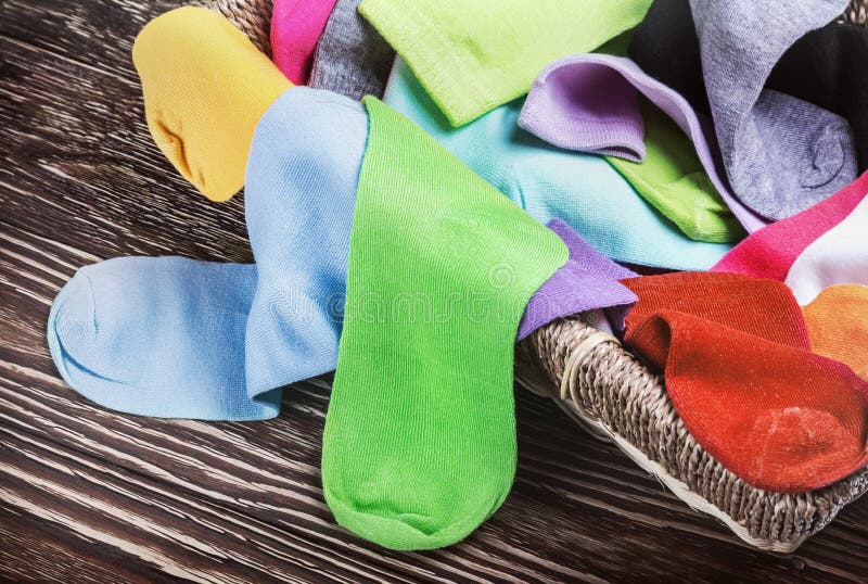 Scattered Multicolored Socks and Laundry Basket Stock Image Image of