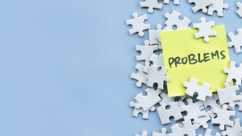 Scattered Puzzle Pieces with Yellow Sticky Note Reading "Problems" on Blue Background. Reading efficiency stock images, royalty-free photos and pictures