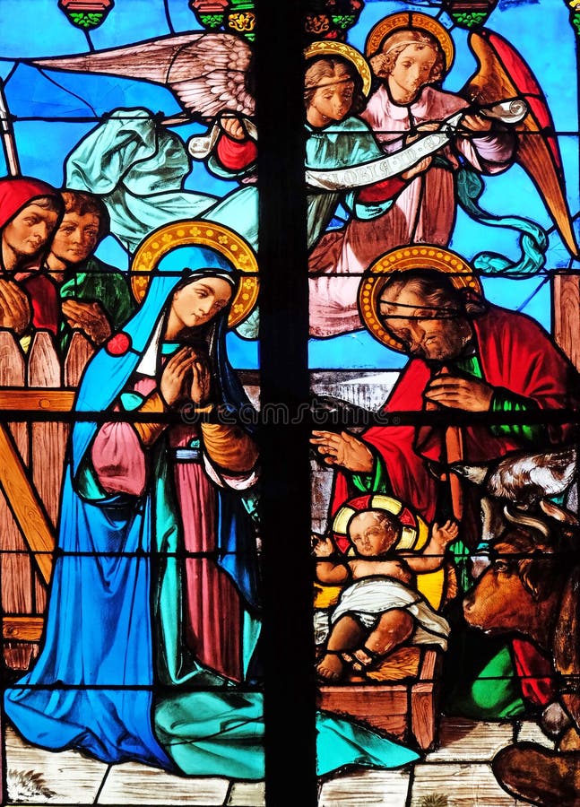 Nativity Scene, Birth of Jesus, stained glass windows in the Saint Eugene - Saint Cecilia Church, Paris, France. Nativity Scene, Birth of Jesus, stained glass windows in the Saint Eugene - Saint Cecilia Church, Paris, France