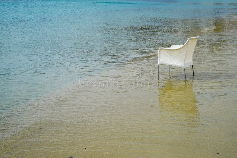 Scene of Empty Chair in White Rattan Sitting on Sand Beach Full of Clear  and Blue Sea Water Background Stock Photo - Image of greece, nature:  110817088