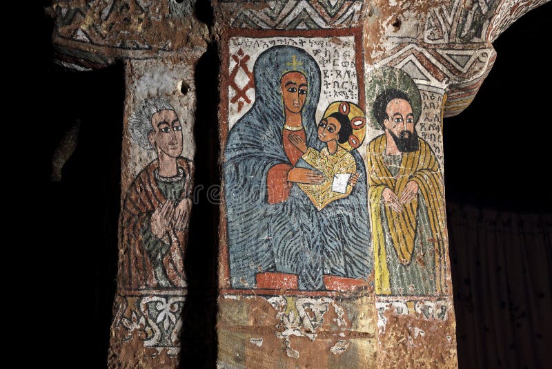 Iconographic scenes and wall murals of saints painted in naive african christian style in Abuna Yemata Guh church in Tigray region of Ethiopia. Iconographic scenes and wall murals of saints painted in naive african christian style in Abuna Yemata Guh church in Tigray region of Ethiopia