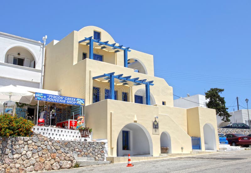 A scene at the traditional village of Pyrgos in Santorini, Greece. A scene at the traditional village of Pyrgos in Santorini, Greece.