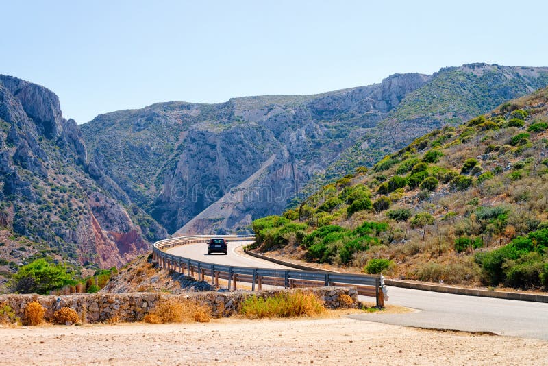 Scenery with car at highway in Cagliari in Sardinia hills royalty free stock photos Scenery with car at highway in Cagliari in Sardinia hills royalty free stock photos