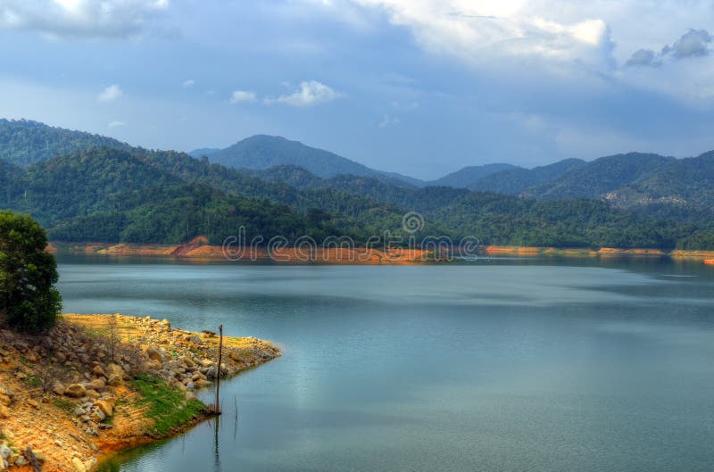 Scenery of man made lake at Sungai Selangor dam during midday stock image Scenery of man made lake at Sungai Selangor dam during midday stock image