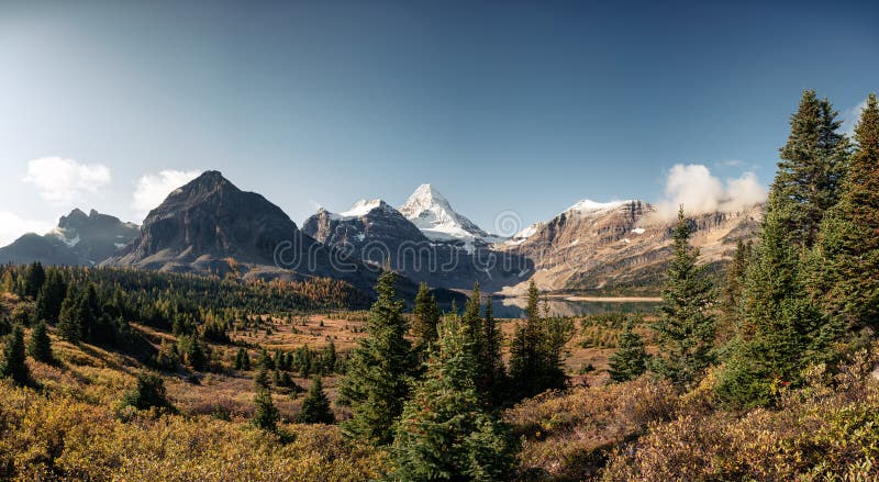 Scenery Of Mount Assiniboine With Lake Magog In Autumn Forest At