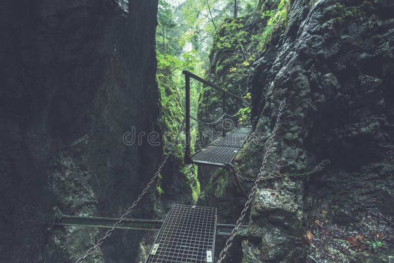 Scenic and beautiful tourism trail in the park Slovensky raj, Slovakia - vintage film look