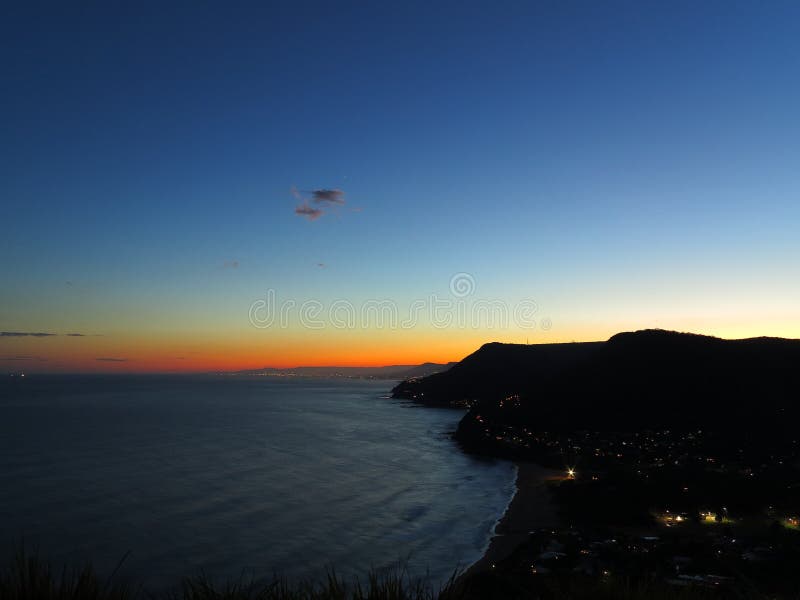 Scenic coastline silhouetted by nightfall view from lookout royalty free stock photography Scenic coastline silhouetted by nightfall view from lookout royalty free stock photography