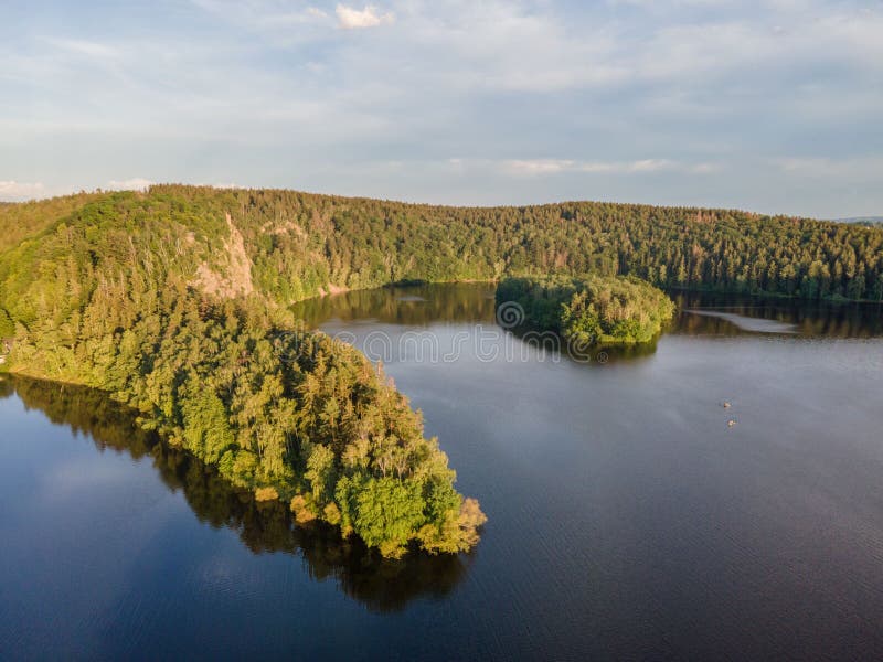 Scenic lake in a forest stock image. Image of tree, light 256722415