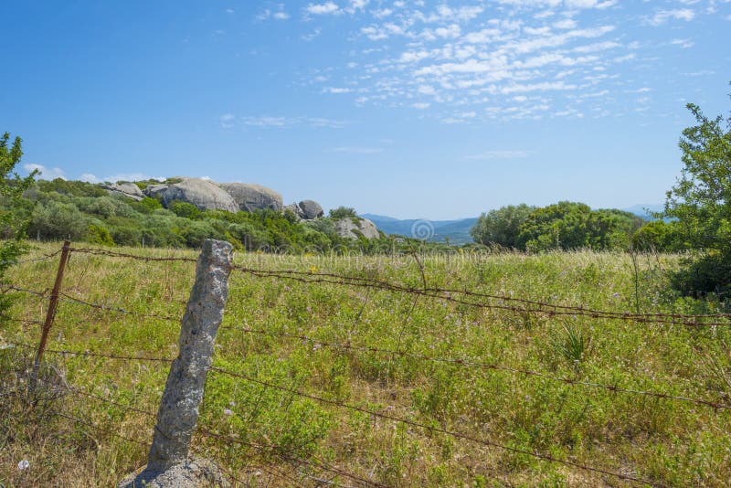 Scenic landscape of green hills and rocky mountains of the island of Sardinia stock photography Scenic landscape of green hills and rocky mountains of the island of Sardinia stock photography