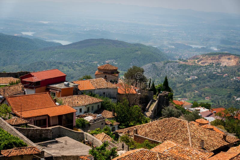 Scenic landscape view of the the old town of Kruja on a mountain slope in Albania with the hills in the background. royalty free stock photo Scenic landscape view of the the old town of Kruja on a mountain slope in Albania with the hills in the background. royalty free stock photo