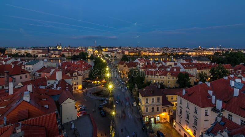 Scenic summer aerial view of the Old Town pier architecture and Charles Bridge over Vltava river day to night timelapse stock video footage Scenic summer aerial view of the Old Town pier architecture and Charles Bridge over Vltava river day to night timelapse stock video footage