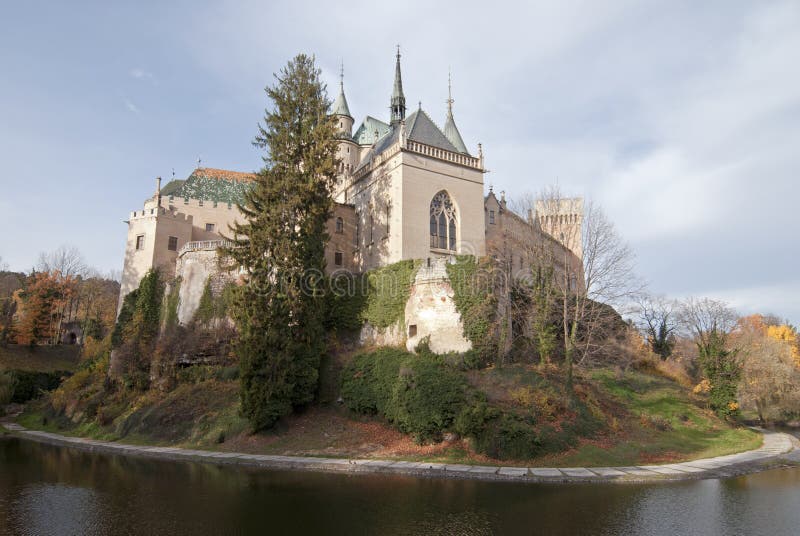Scenic view of autumn Bojnice castle with moat