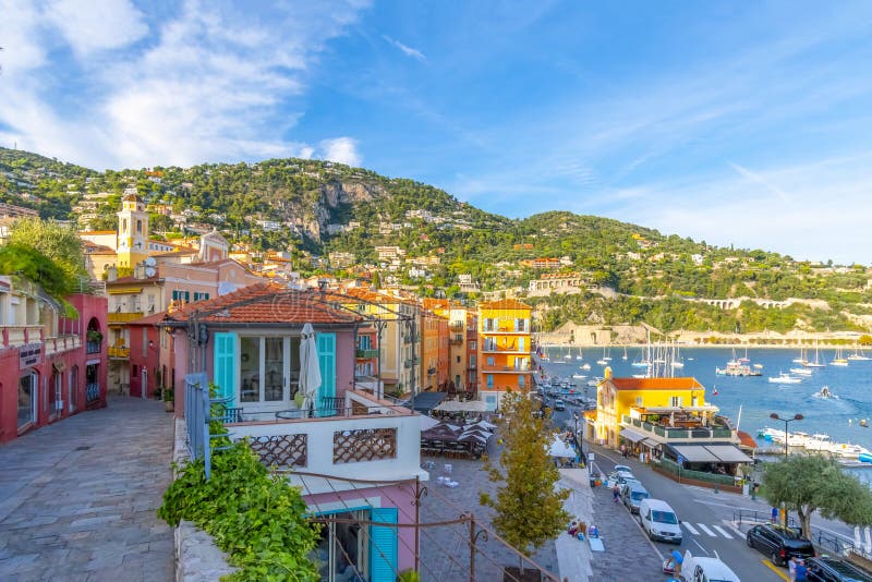 Scenic view of the colorful town, bay and marina of Villefranche Sur Mer, on the French Riviera coast of Southern France stock photos Scenic view of the colorful town, bay and marina of Villefranche Sur Mer, on the French Riviera coast of Southern France stock photos