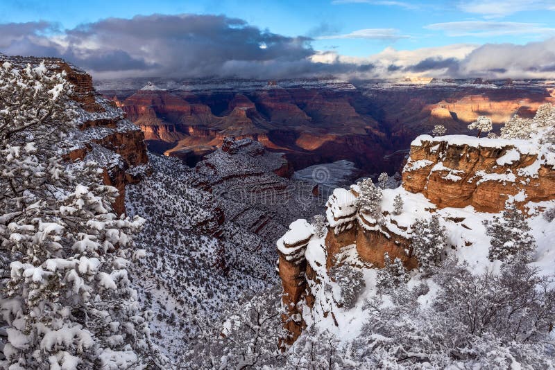 Scenic view of the Grand Canyon after a winter snow storm. Scenic view of the Grand Canyon after a winter snow storm from the South Rim in Grand Canyon National stock images