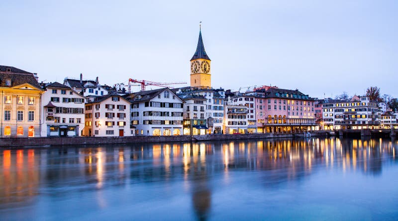 scenic view of historic Zurich city center with famous Fraumunster and Grossmunster Churches and river Limmat at Lake Zurich