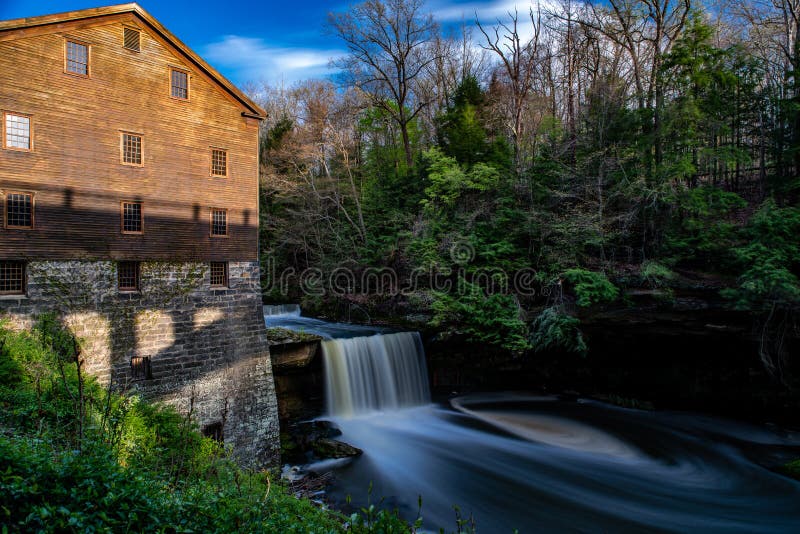 A scenic view of Lanterman`s Falls and Lanterman Mill in the late evening in Mill Creek Park, Youngstown, Ohio. A scenic view of Lanterman`s Falls and Lanterman Mill in the late evening in Mill Creek Park, Youngstown, Ohio.