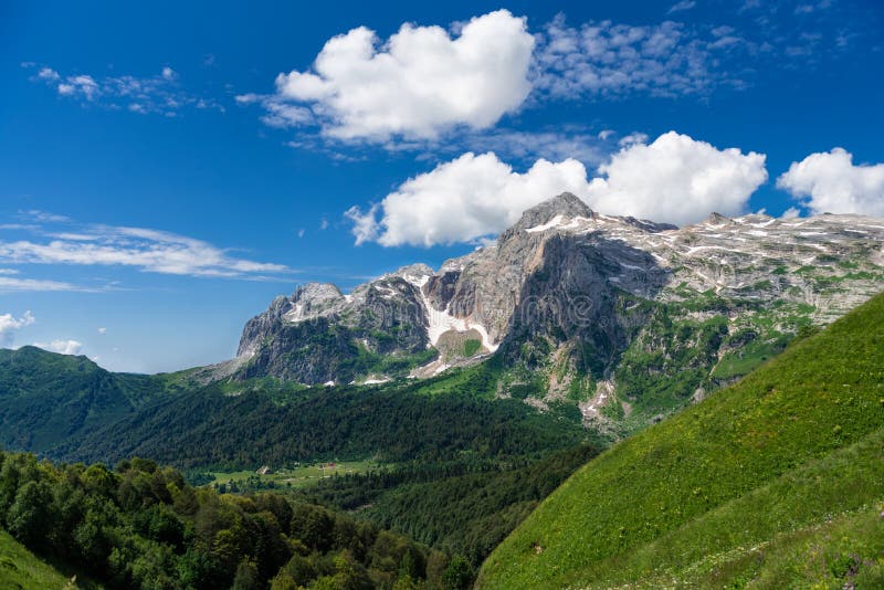 Scenic view of Mount Fisht at summer sunny day. Caucasian Biosphere Reserve. Republic of Adygea, Russia. Wallpaper, Travel