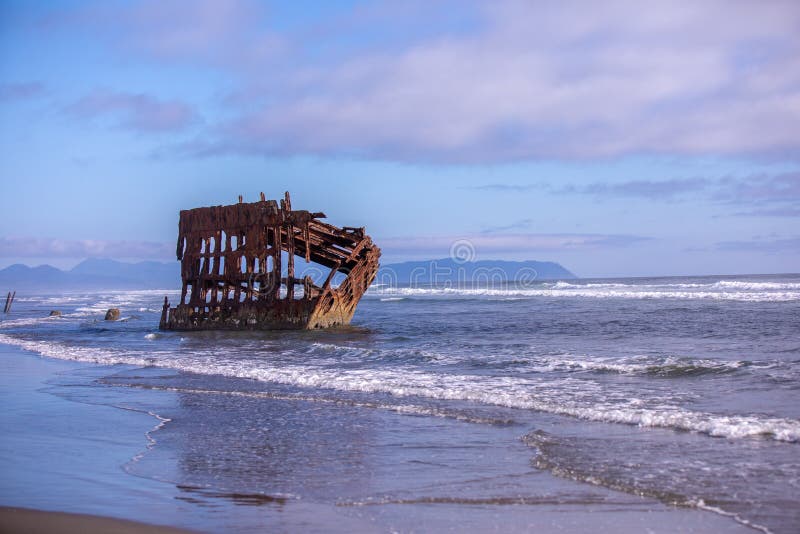 Scenic view of shipwreck on beach